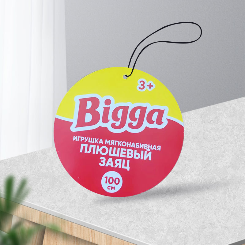 Zergatik da plastikozko arropa-etiketa biribila zirkulu baten antzera?